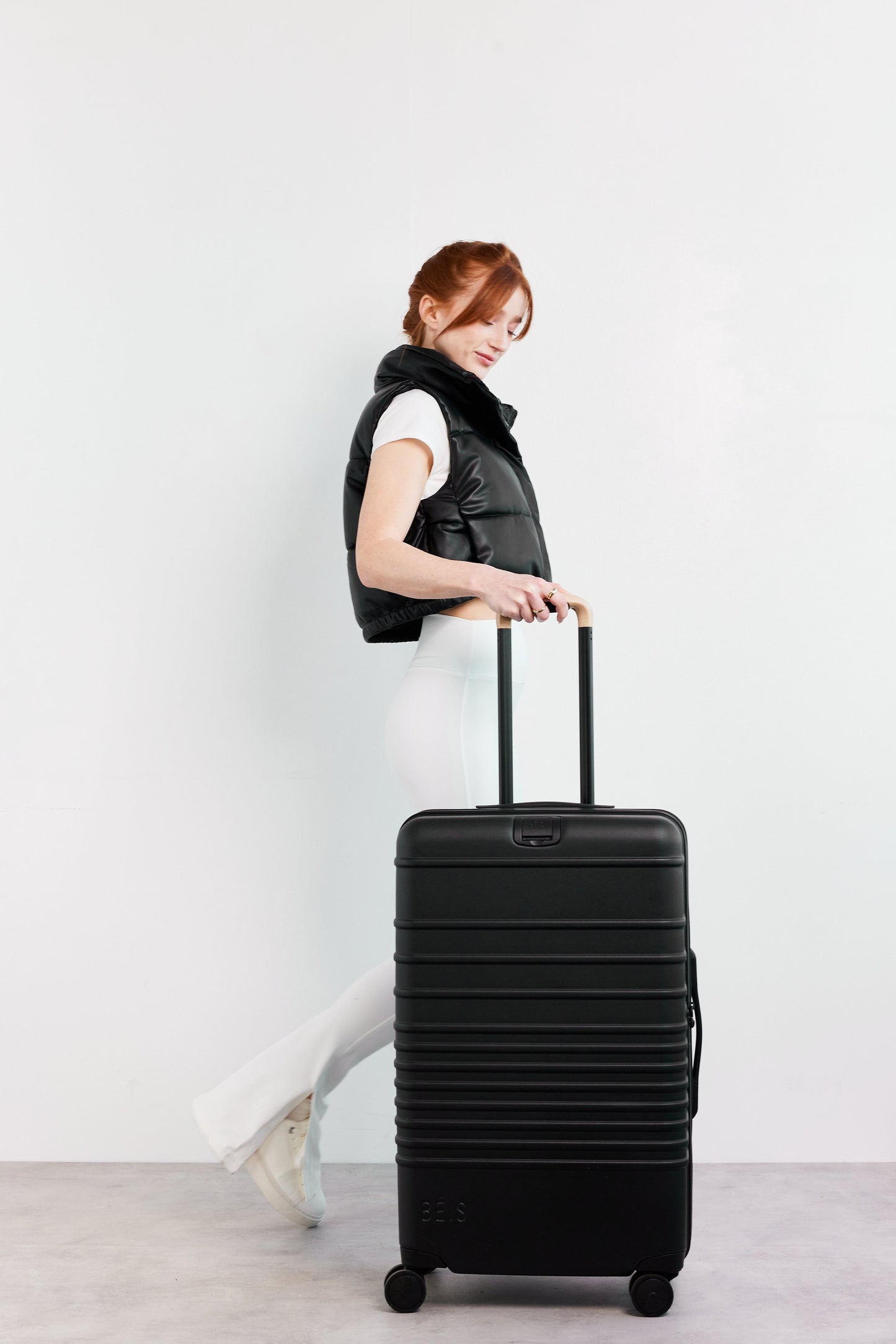 Resale The Medium Check-In Roller in Black