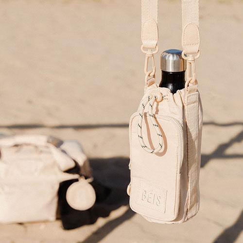 Resale The Water Bottle Sling in Beige